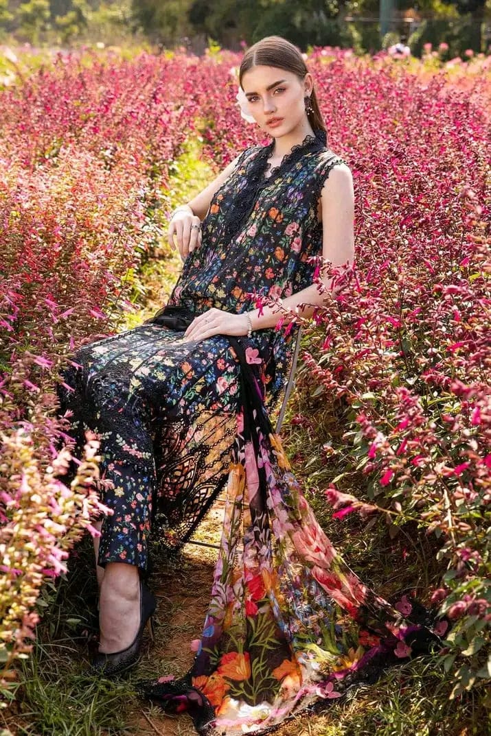 Black floral outfit photographed in a flower field